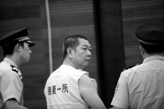 广州房叔获刑11年21套房无恙 法官称其有能力买.jpg